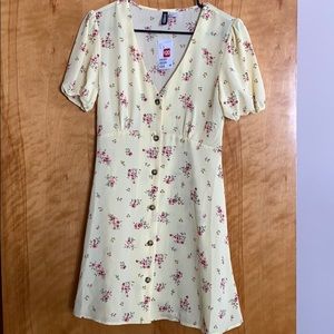 Yellow floral dress. Never worn